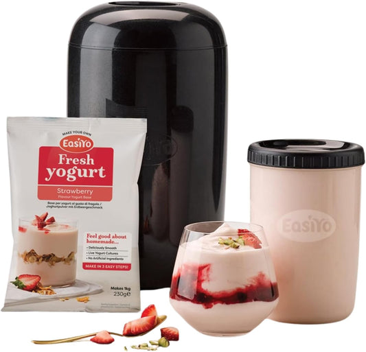 EasiYo yogurt maker with strawberry yogurt package, container, and dessert.